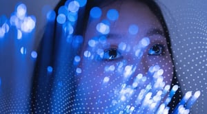 A woman's face with blue fiberoptic light