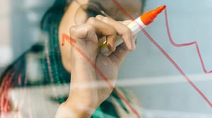 Woman drawing a graph