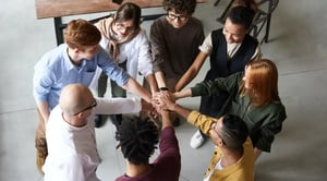 photo-of-people-holding-each-other-s-hands-3184436